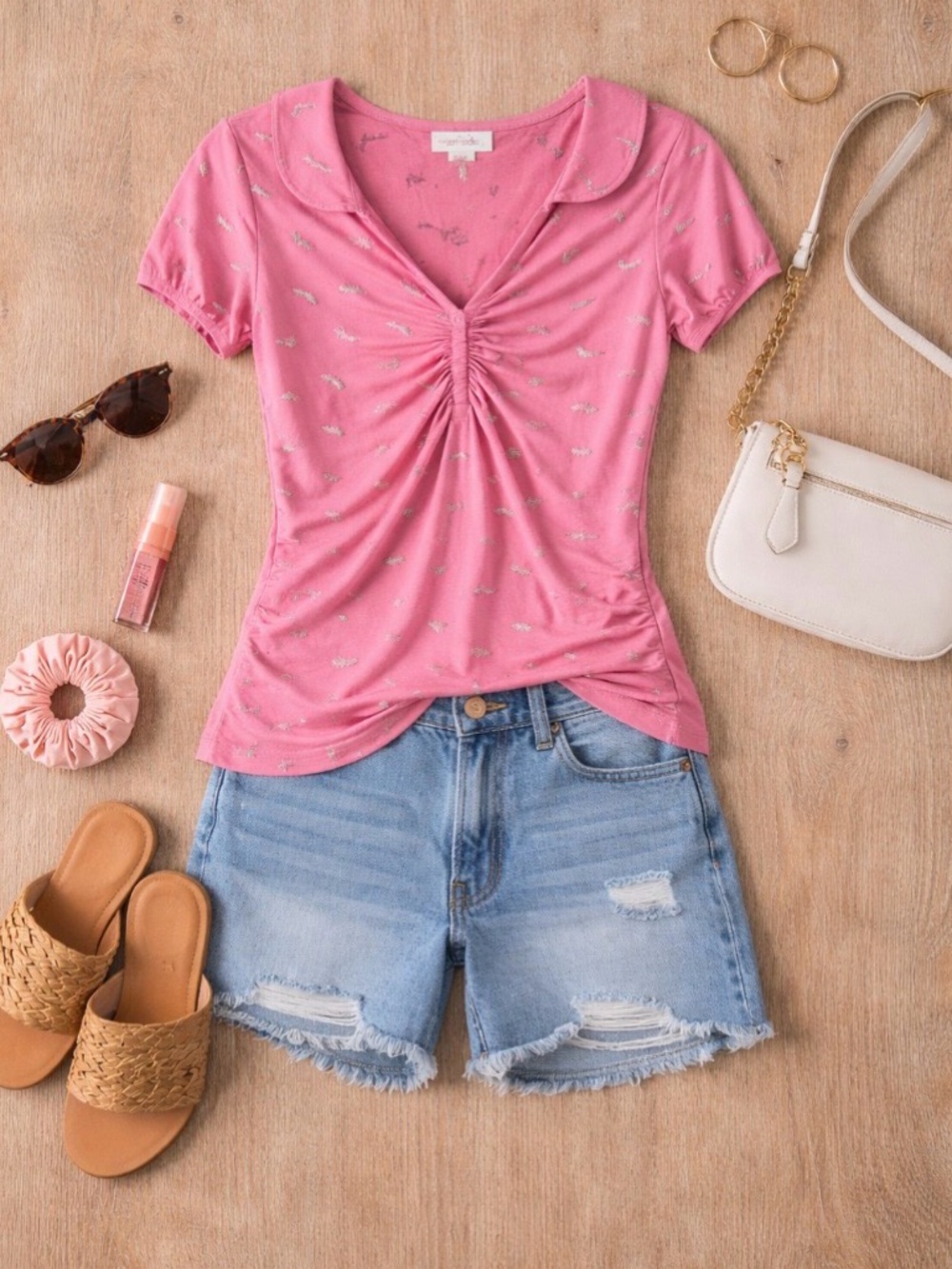 Pink button-up top from the brand love rocks